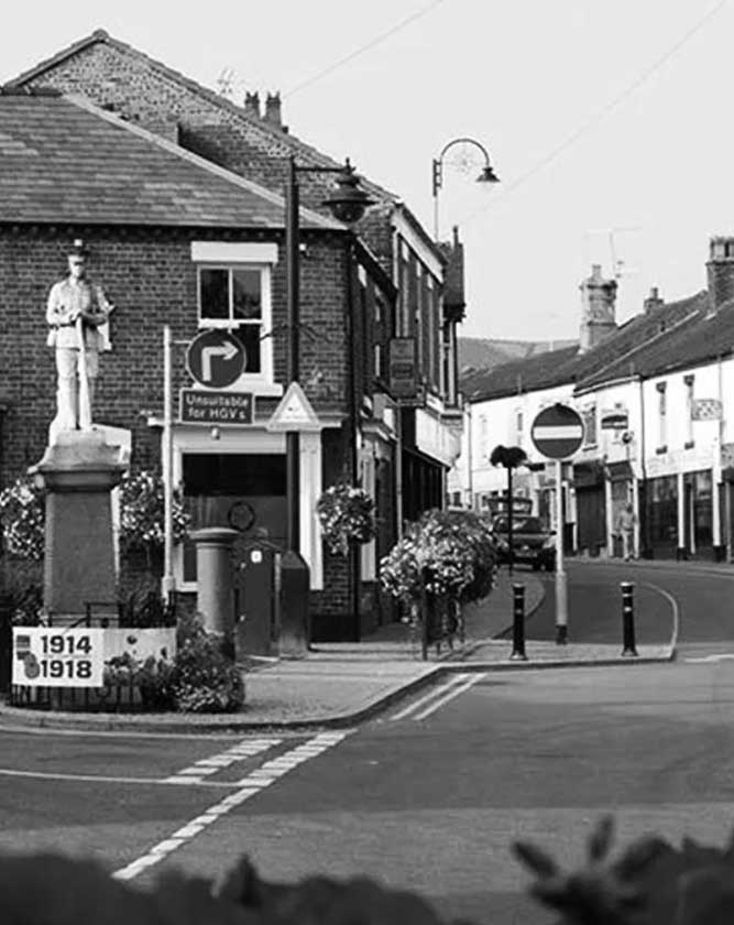 Web design services for businesses in Biddulph, Staffordshire, featuring the town's war memorial and high street